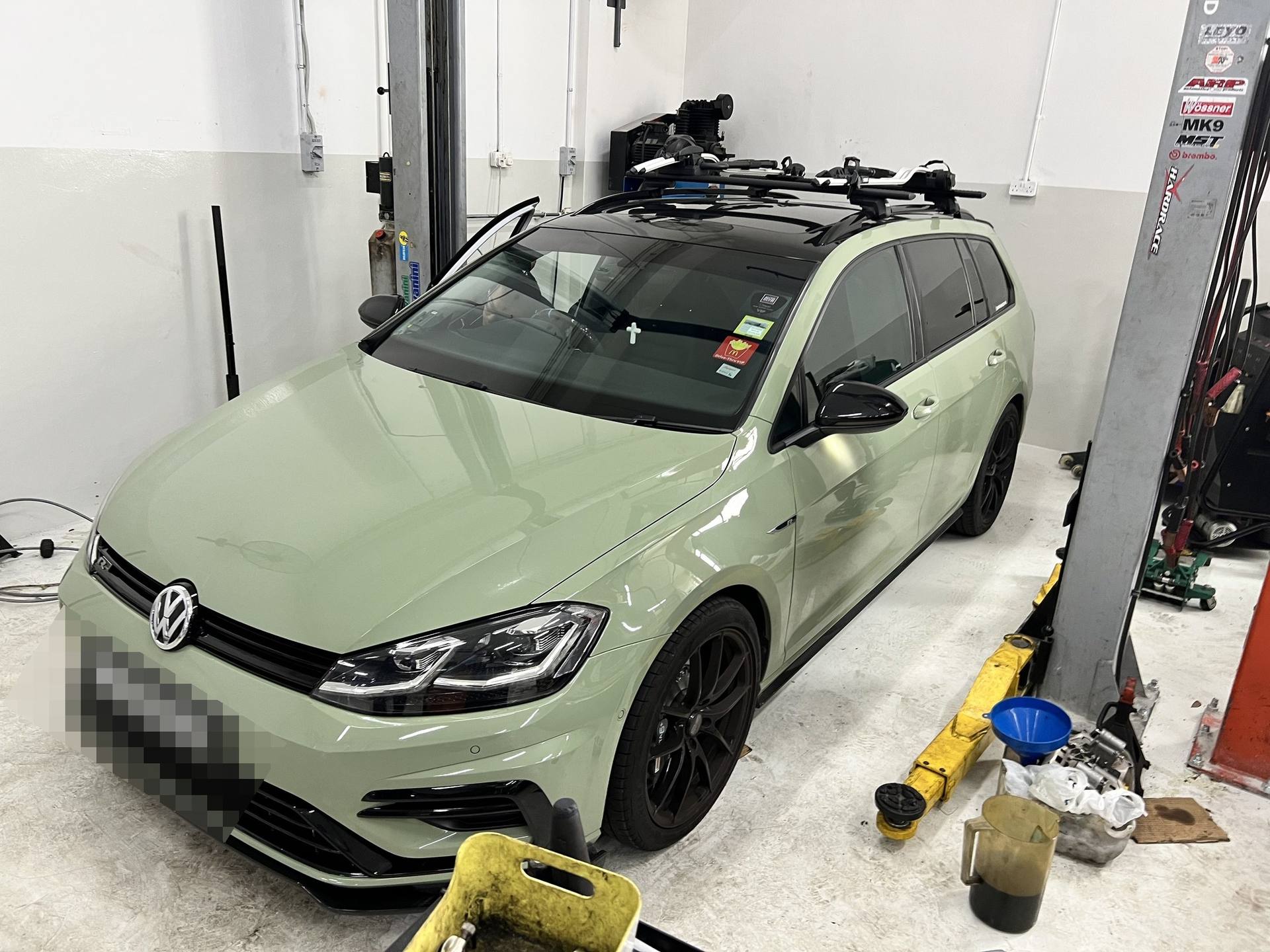 Green Golf R Estate inside the MK9 workshop